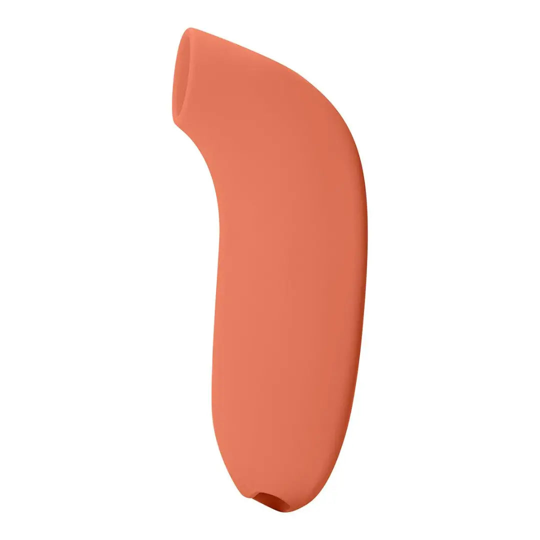 Dame Aer clitoral suction toy in papaya orange sideview