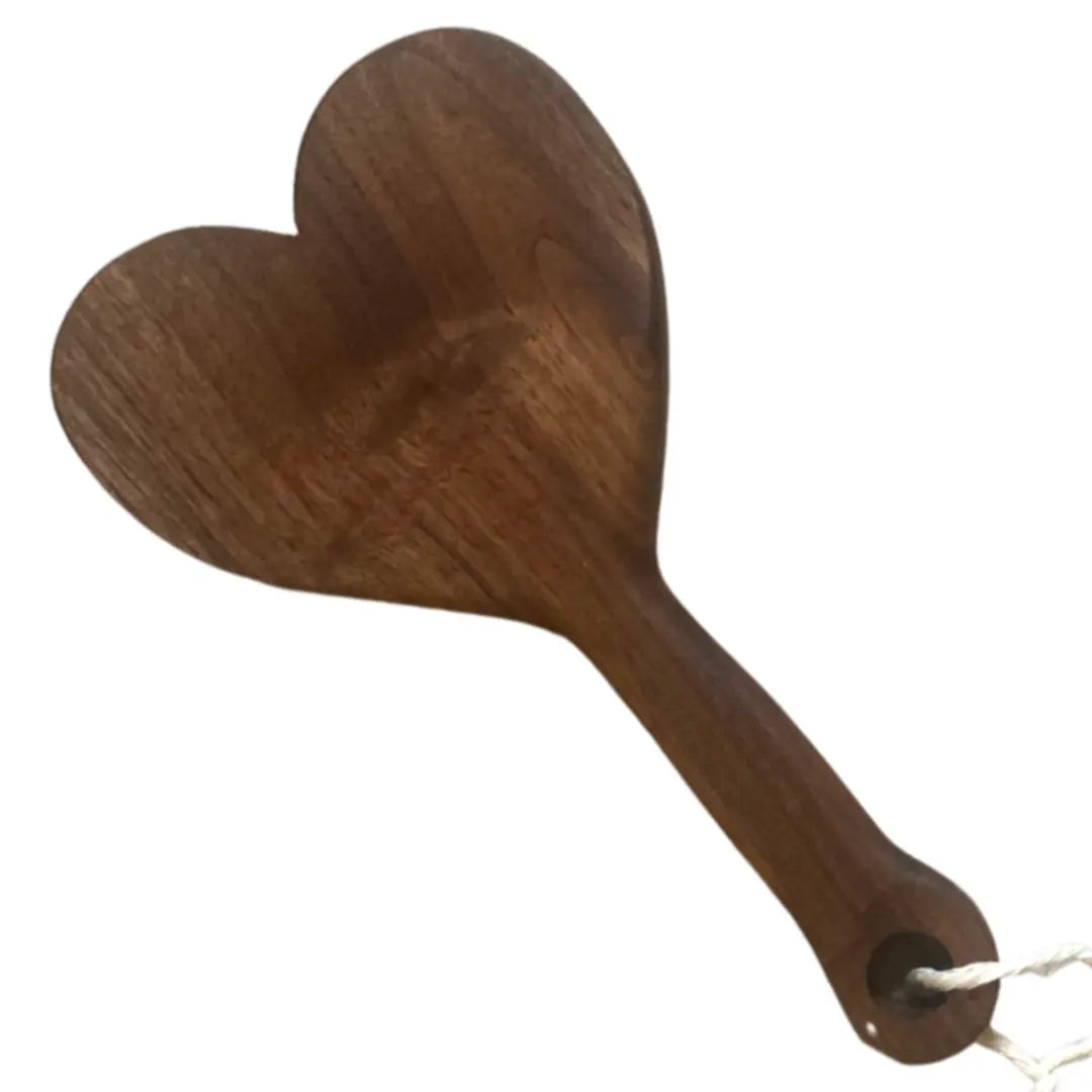 Handmade wood paddle in a heart shape. Walnut