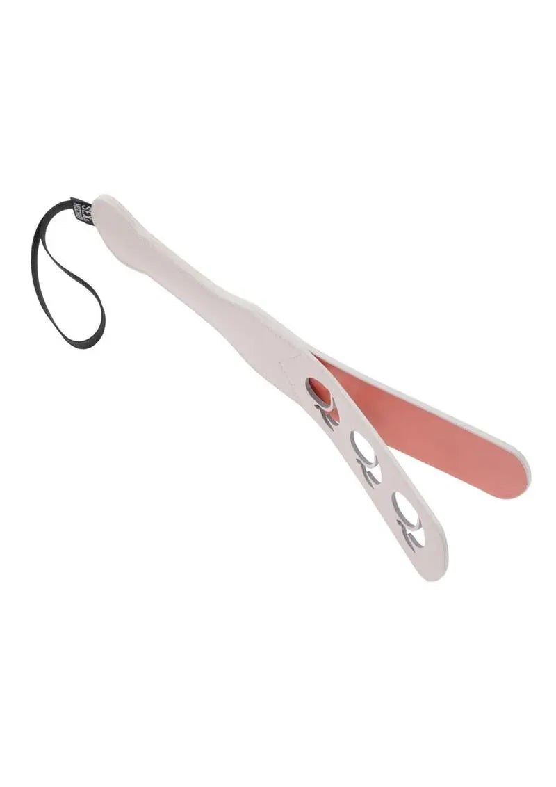 Peaches N Creame vegan leather paddle with peach shaped cut outs