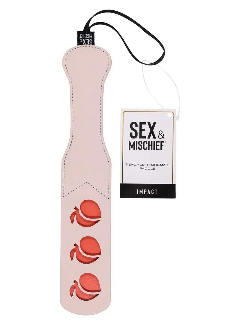 Peaches N Creame vegan leather paddle with peach shaped cut outs