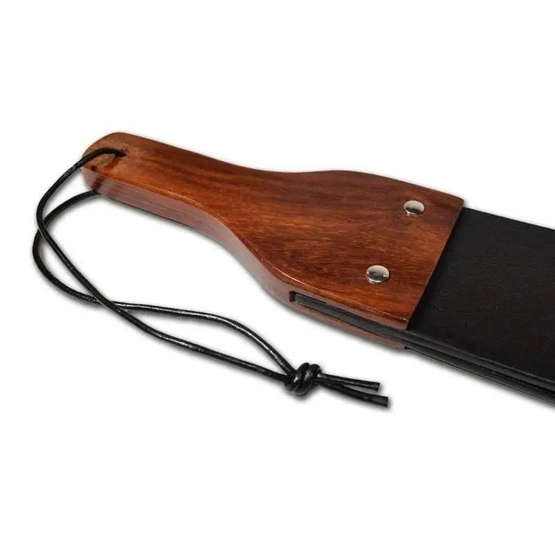 Riveted wooden handle of Flapper Paddle with wrist strap