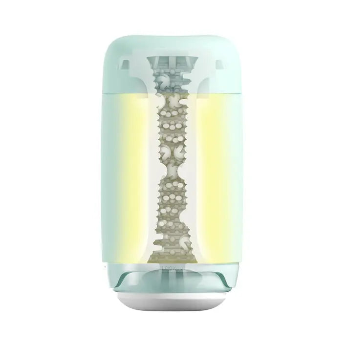 Cross-section of Tenga Puffy in green showing stimulating shapes
