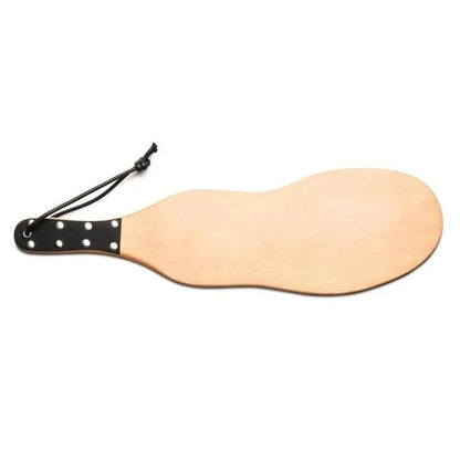 Flat wooden back side of rubber boot tread BDSM paddle