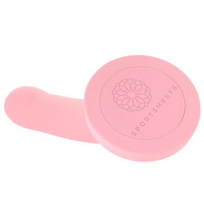 Embossed Sportsheets logo on base of Daze pink silicone harness compatible vibrating dildo
