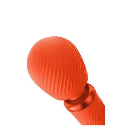 Lightly ribbed texture on silicone head of the orange Vim vibrating wand