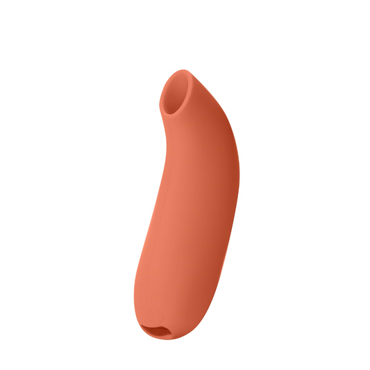 Dame Aer clitoral suction toy in papaya orange